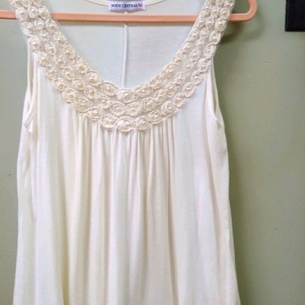 Flowy white tank